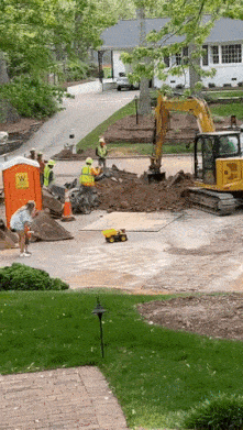 Excavator and boy with truck