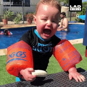Baby eating banana