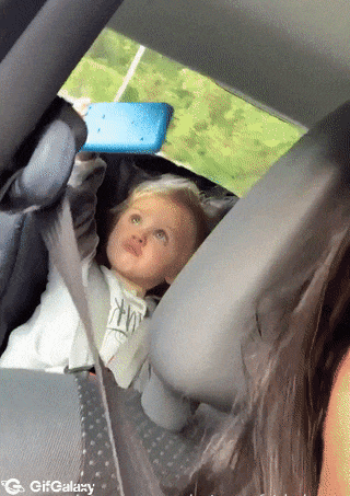 Baby in car and selfie