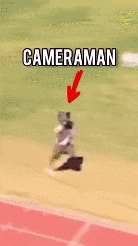 Fast cameraman on athletics track