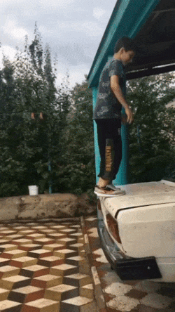 Boy does somersaults backwards