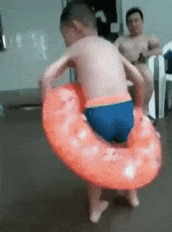 Boy jumps into pool