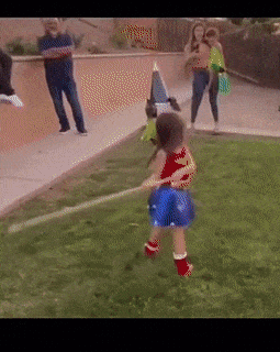 Little girl hits doll