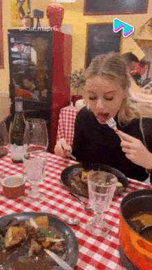 Girl eats and drinks wine