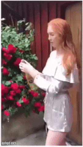 Girl opens champagne