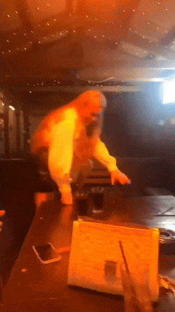Girl climbs on table