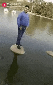 Man walking on stones