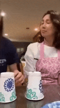 Daughter shows trick with glasses