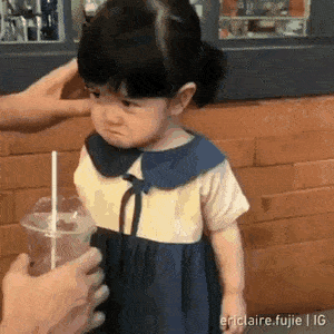 Angry little girl and juice