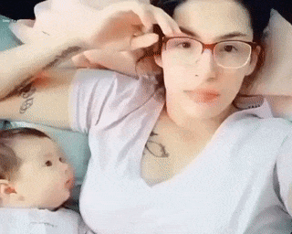 Mother and baby smile