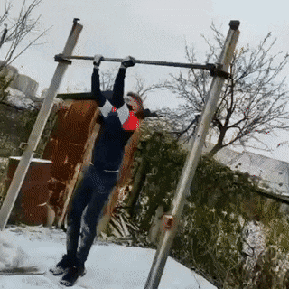 Guy exercise on shaft