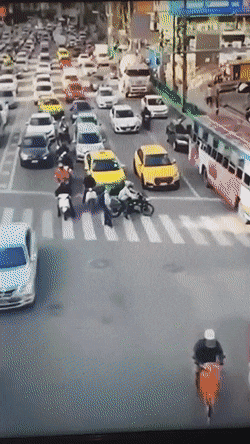 Motorcyclist helps old man