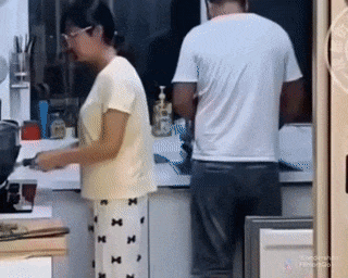 Husband and fire in kitchen