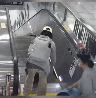 Escalators and suitcase