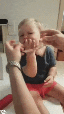 Child reaction after putting on glasses