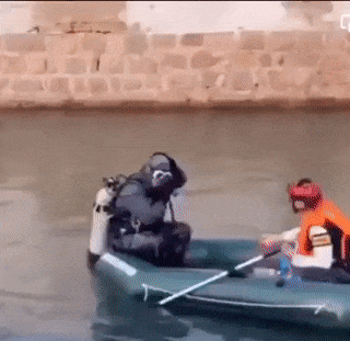 Diver in shallow water