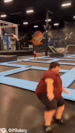 Big man on trampoline