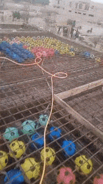 Building concrete slab with balls