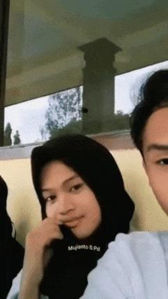 Girl with scarf or boy