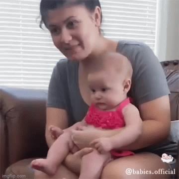 Baby punches his brother away