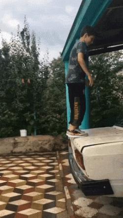 Boy does somersaults backwards