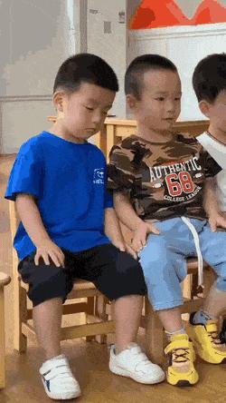 Boy sleeps on his shoulder