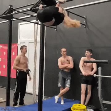 Girl and men in gym