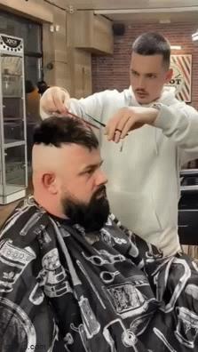 Hairdresser and man with wig