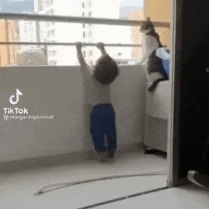 Cat looks after child