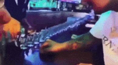 Guy at bar is drinking alcohol