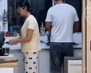 Husband and fire in kitchen