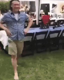 Father and daughter on swing