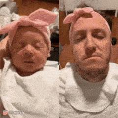 Father imitates baby
