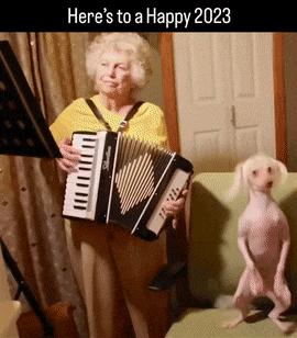 Dog dances to harmonica