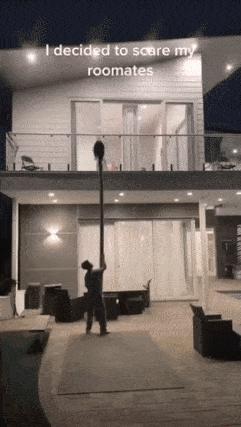 Prank with mask on stick