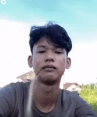 Straw of grass in his mouth