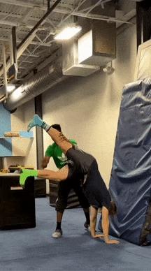 Trainer on the mat