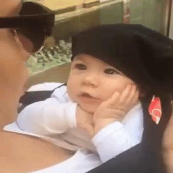 Imaginary baby looks at mother