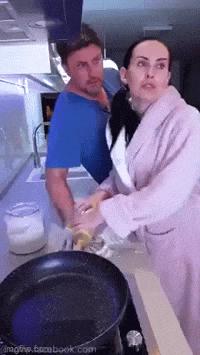 Woman chef watching tv