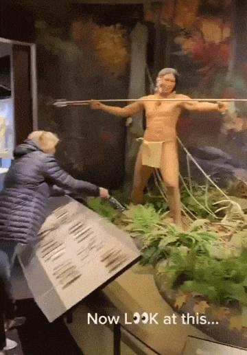 Woman and wax figure